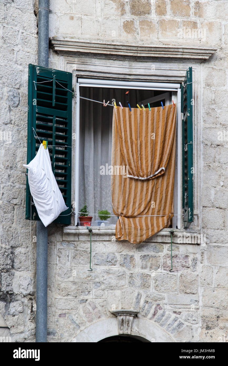 Open Window And Bed Sheets Stock Photo