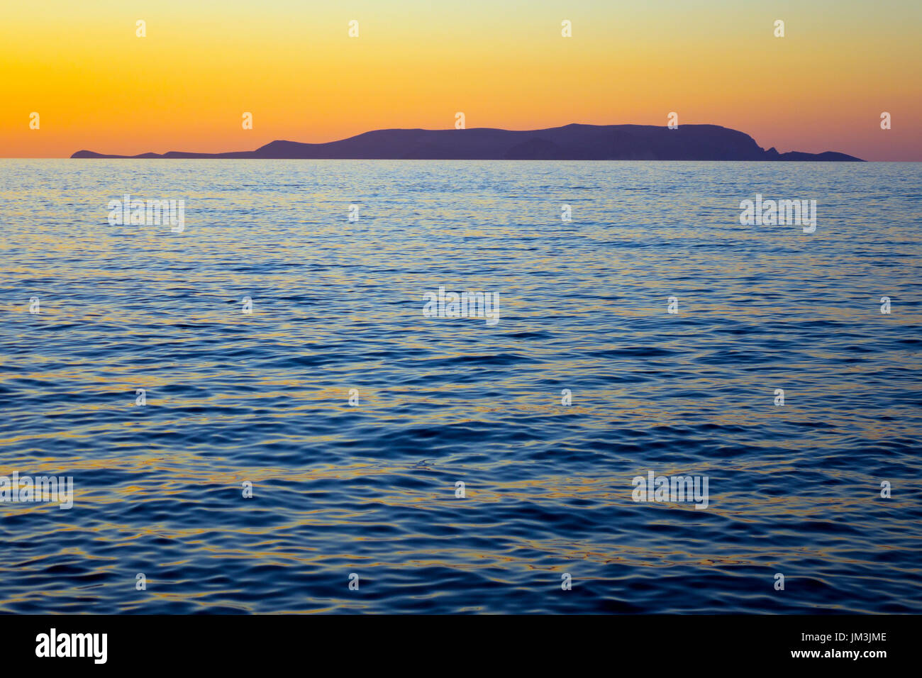 Evening view to the island of Dia from Crete Greece Stock Photo