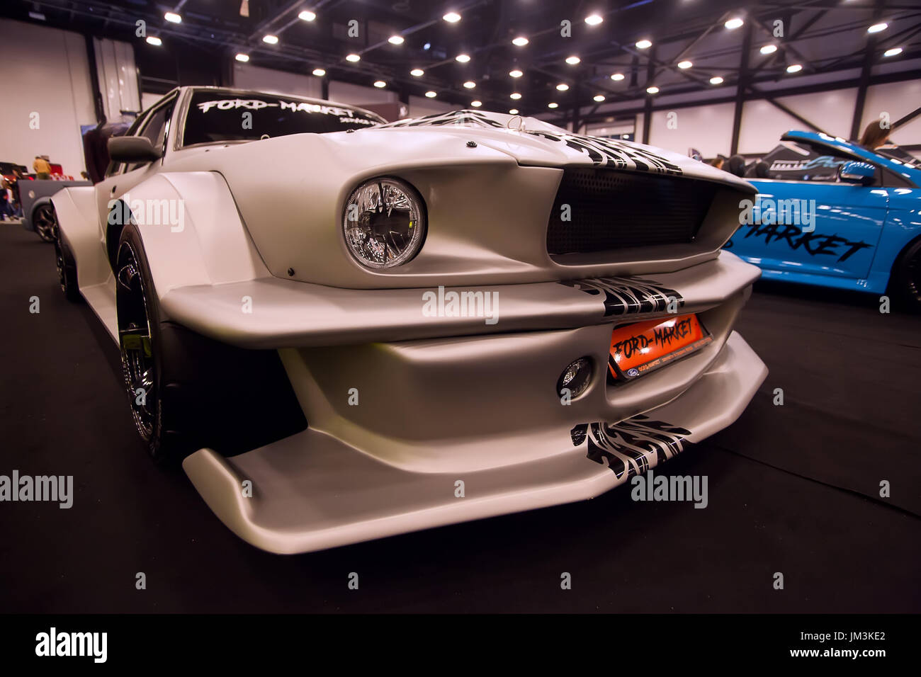SAINT-PETERSBURG, RUSSIA - JULE 23, 2017: Front view of car Ford Mustang with tuning on Royal Auto Show. Wide Car Fender and bumper. Close up of Car h Stock Photo