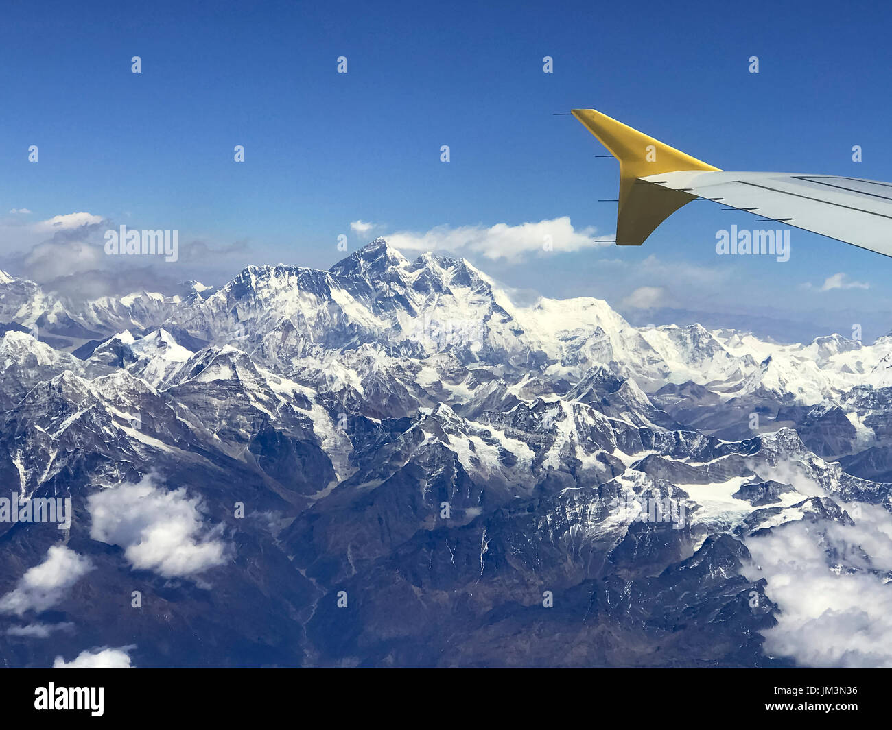 Mount Everest from plane window. Himalayas. Stock Photo