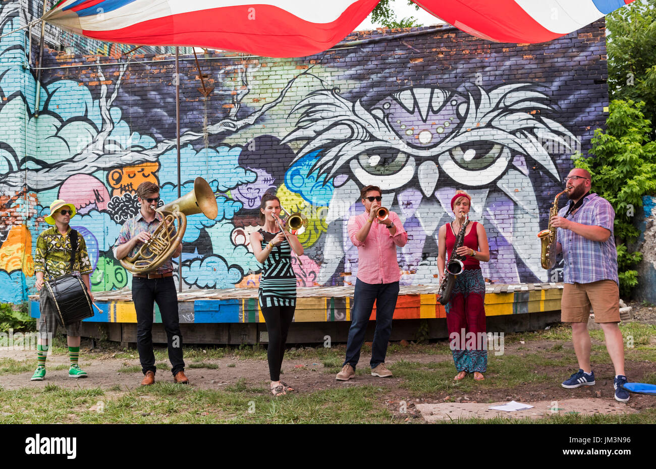 Detroit, Michigan - The band Rhyta Musik plays during Crash Detroit, a festival of street bands at the Lincoln Street Art Park. Stock Photo