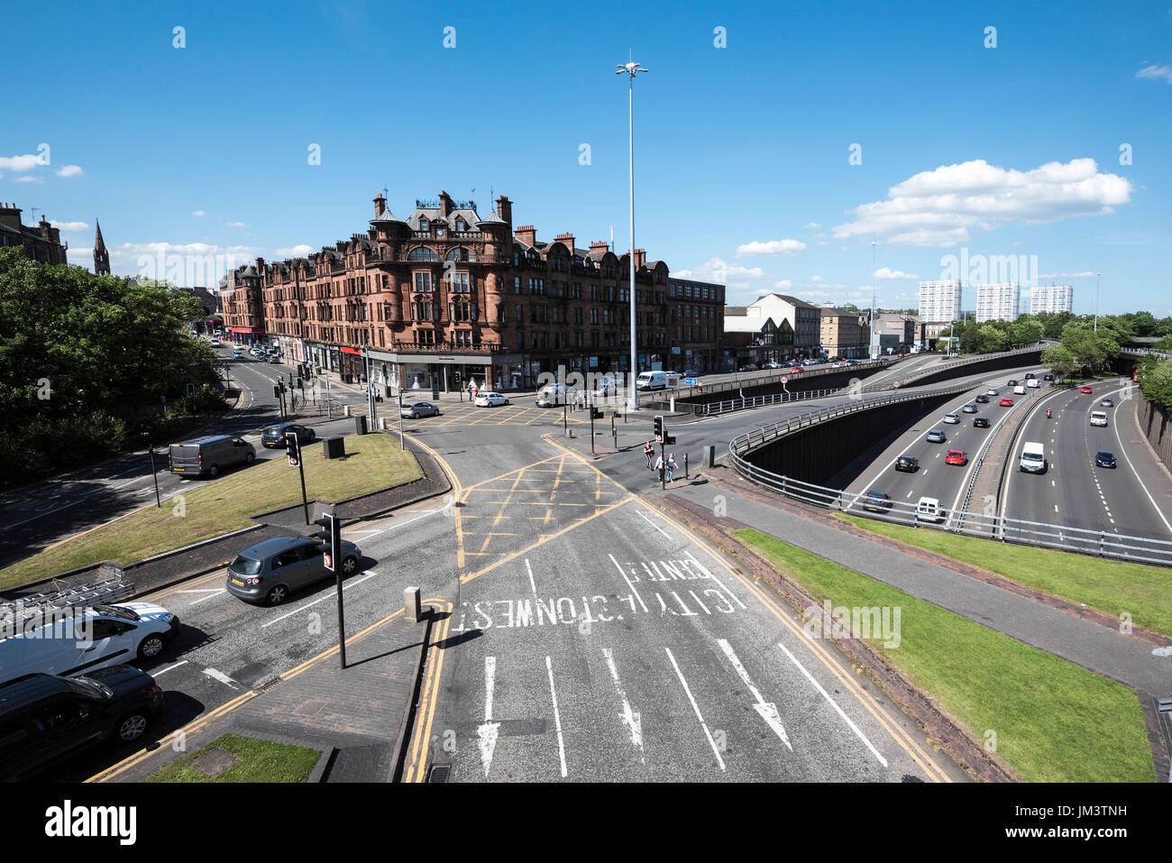 View of busy road junction in Charing Cross area of Glasgow in city centre. Stock Photo