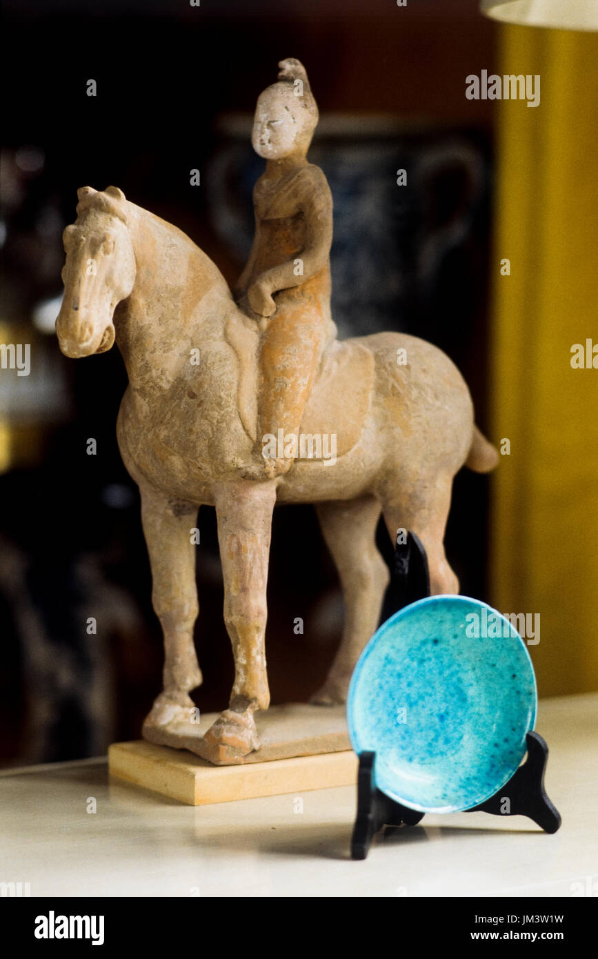 Stone equestrian sculpture by blue plate Stock Photo