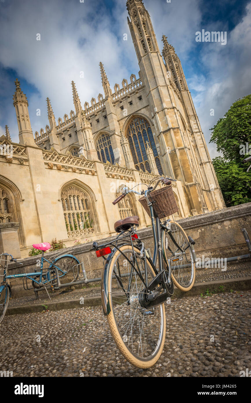 A student's bicycle locked up on the cobbled street outside King's College Chapel in Cambridge, Cambridgeshire, UK Stock Photo