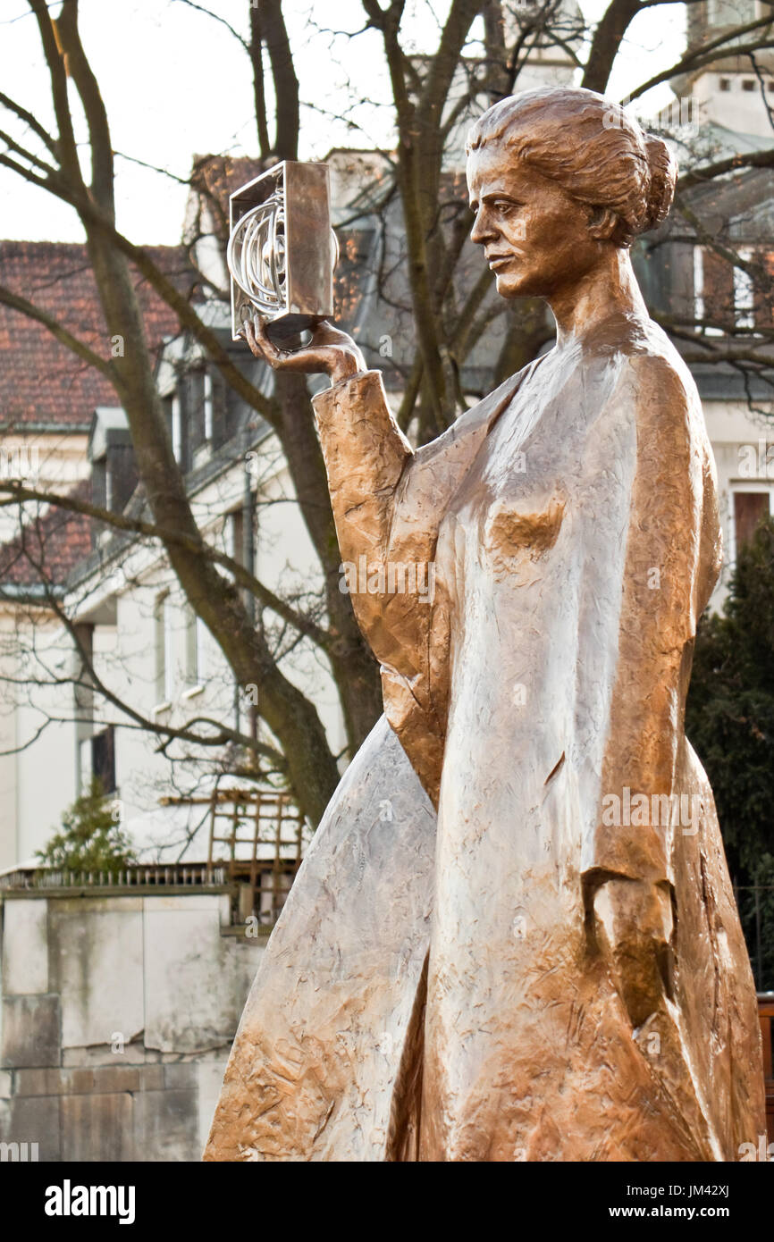 Warsaw, Poland - December 2, 2014: Sculpture of Marie Sklodowska-Curie by polish sculptor Bronislaw Krzysztof. The Nobel prize winning scientist is ho Stock Photo