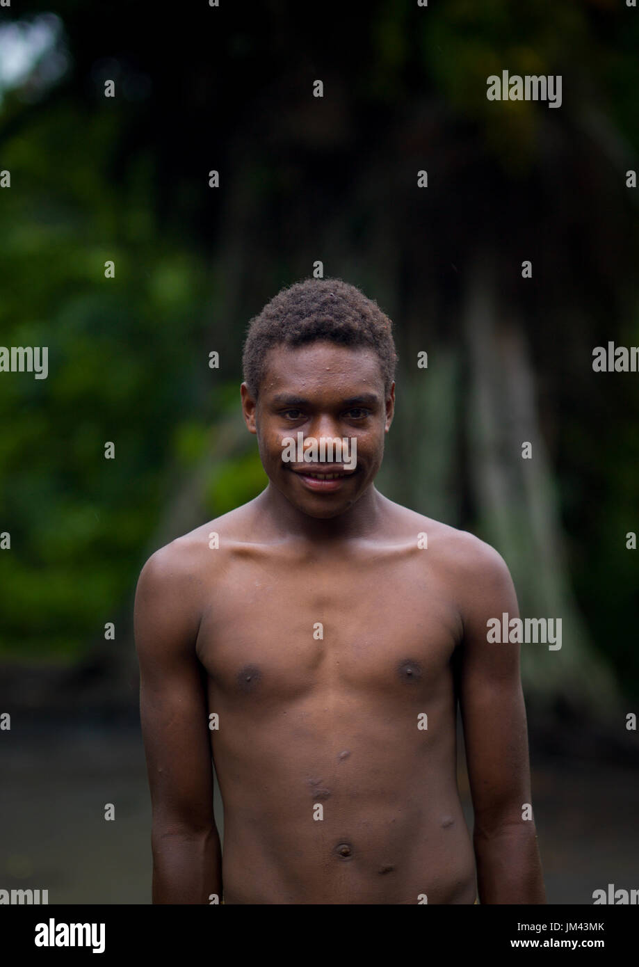 Teenager standing in the middle of the ceremonial square, Tanna island, Yakel, Vanuatu Stock Photo