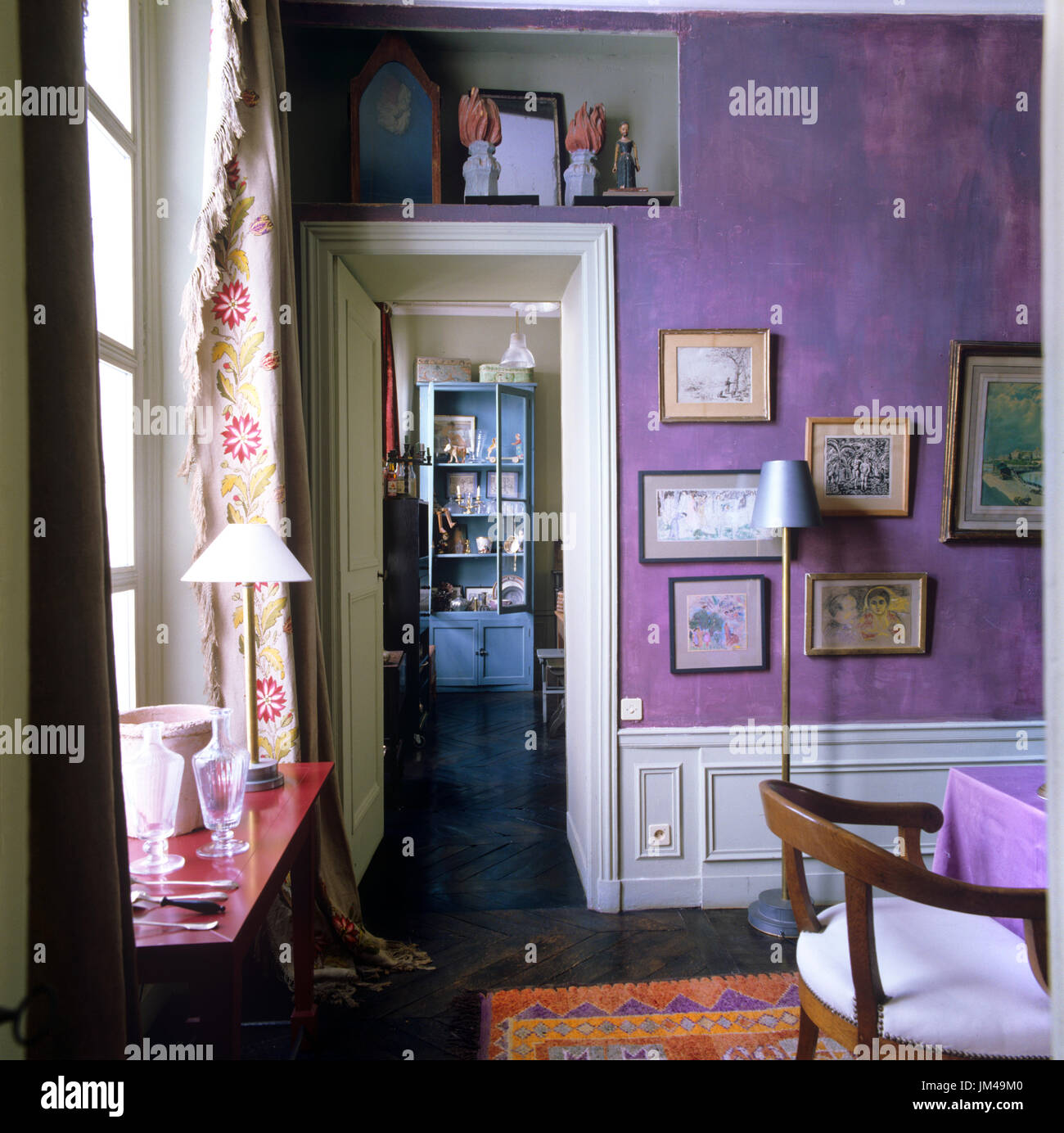 Dramatic purple dining room Stock Photo