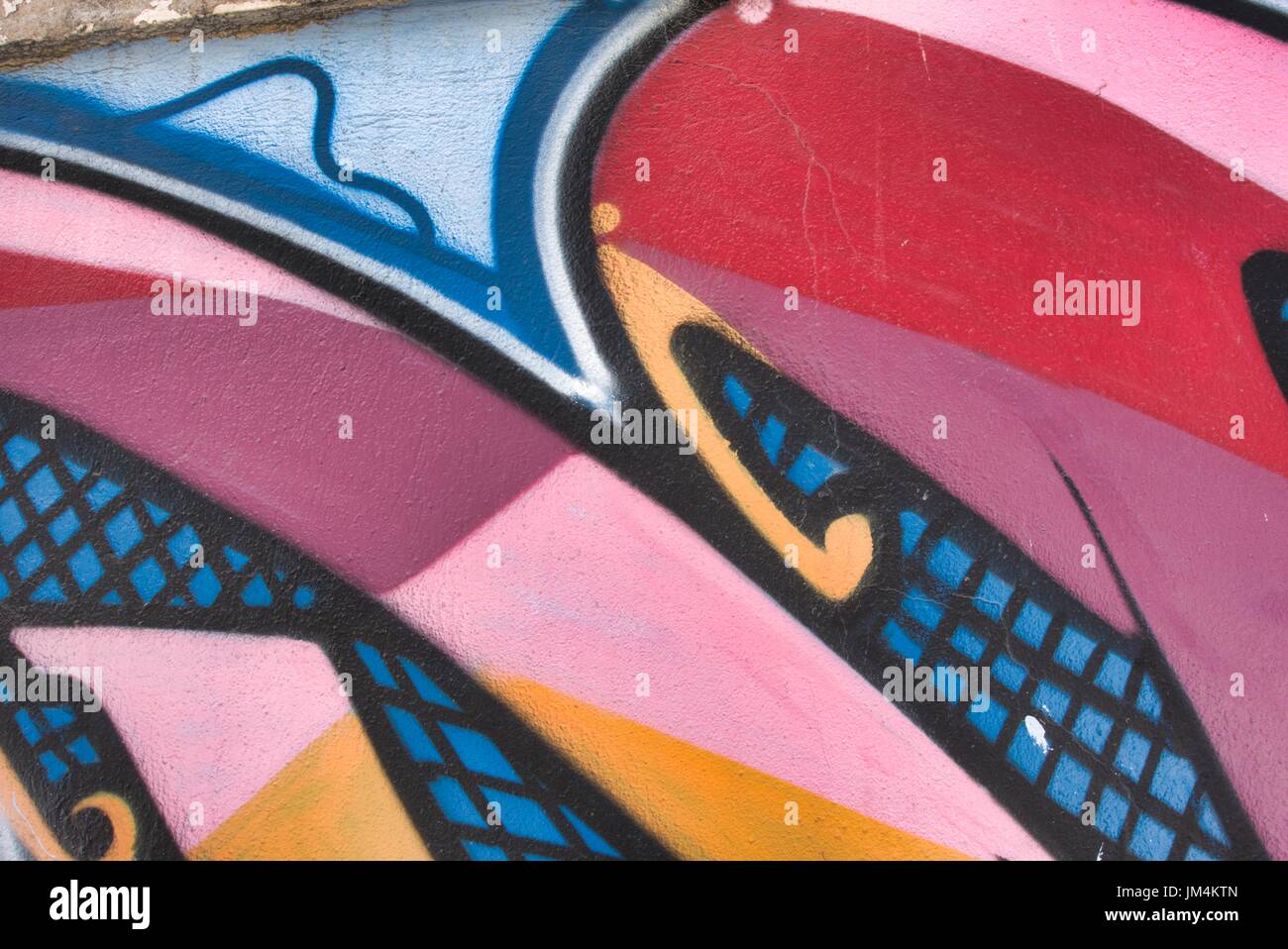 Details of grafiti with vivid colors on wall. Useful for backgrounds, backdrops and concept work. Stock Photo