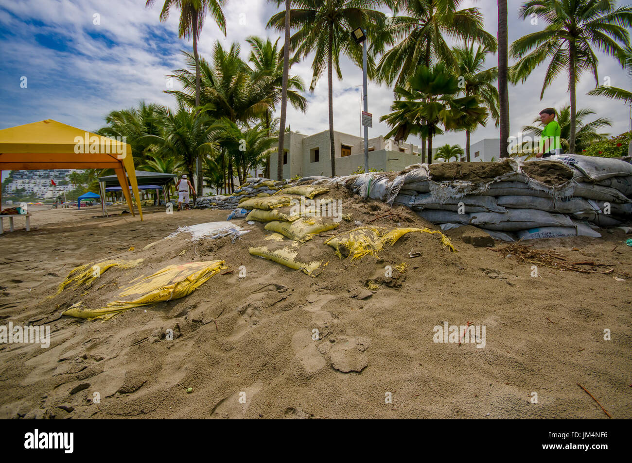 Esmeraldas, Ecuador - March 16, 2016: Sandbags to protect against the flood by tsunami in Same Beach, Casablanca Stock Photo