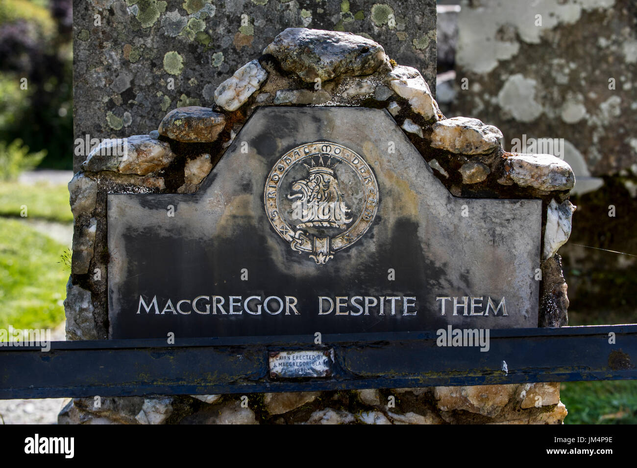 Headstone with epitaph MacGregor Despite Them on the grave of Rob Roy MacGregor at the Balquhidder kirkyard, Stirling, Scotland, UK Stock Photo