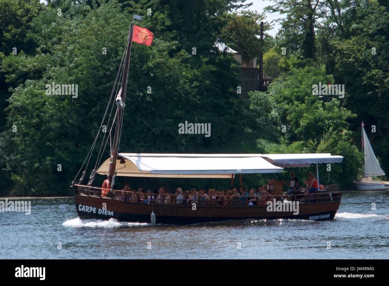 Tourists on river boat trip on Dordogne river, Bergerac, Dordogne, France Stock Photo