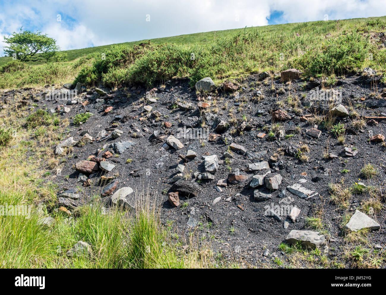 Remains of an old coal tip that was above the colliery at Cwmparc, Rhondda Valley, south Wales Stock Photo