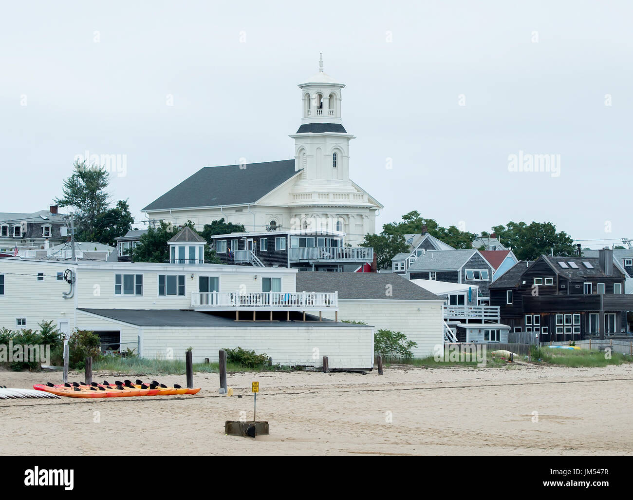 Provincetown PTown MA Cape Cod shoreline with sand foreground historic