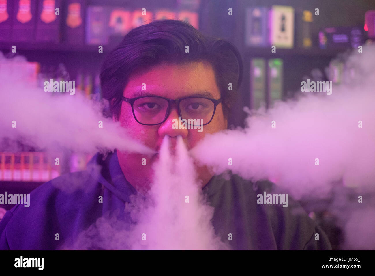 Vape tricks hi-res stock photography and images - Alamy