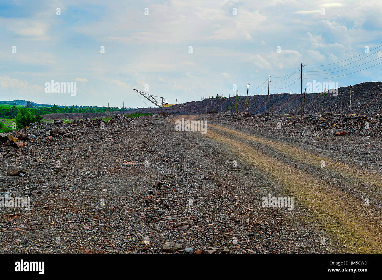 Dumps rock mountains from industrial quarries. Stock Photo