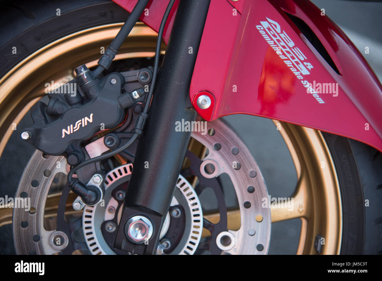 Motorbike front wheel detail Stock Photo