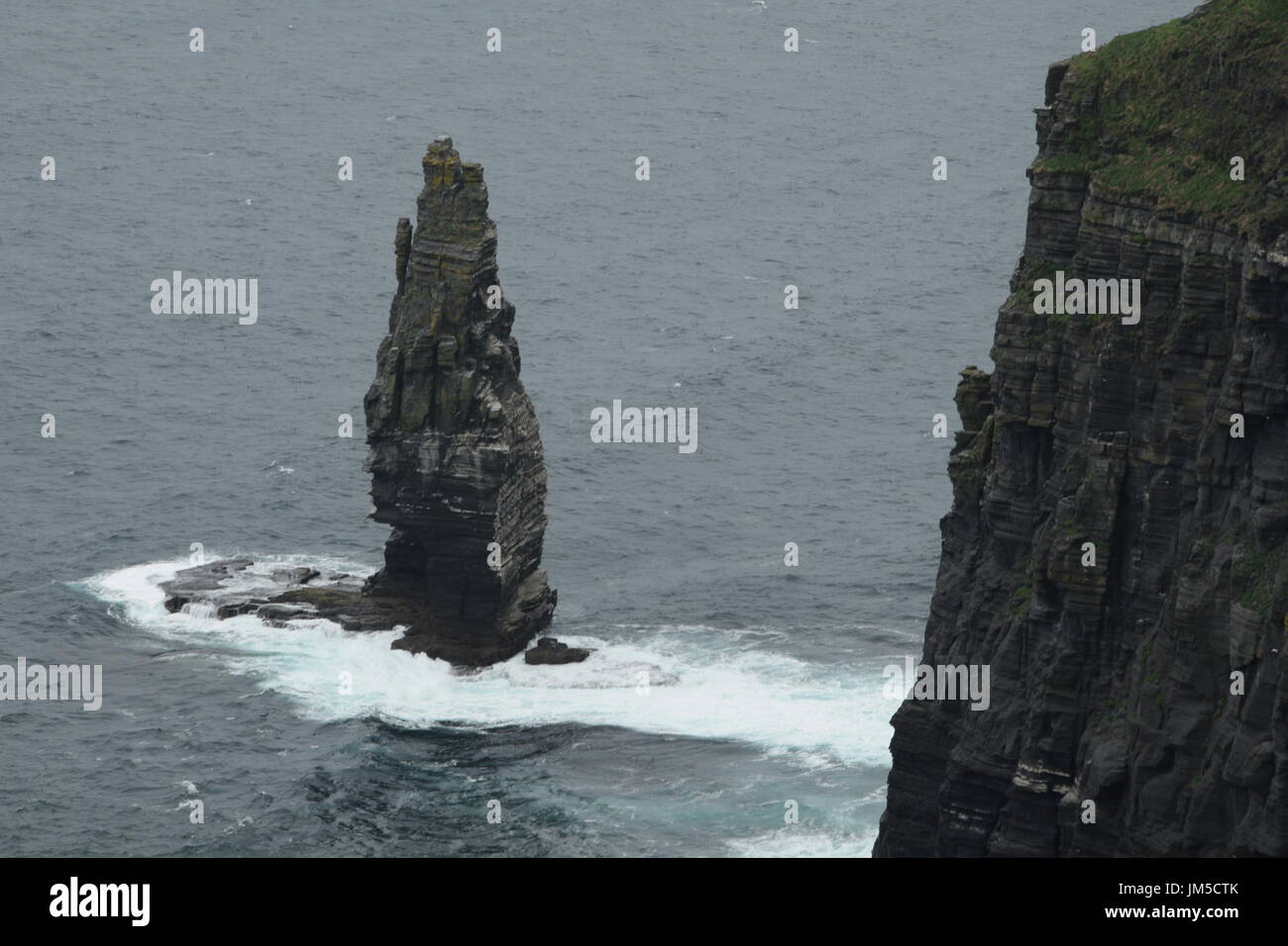 View of the Cliffs of Moher with Branaunmore sea stack in the County Clare, west Ireland Stock Photo