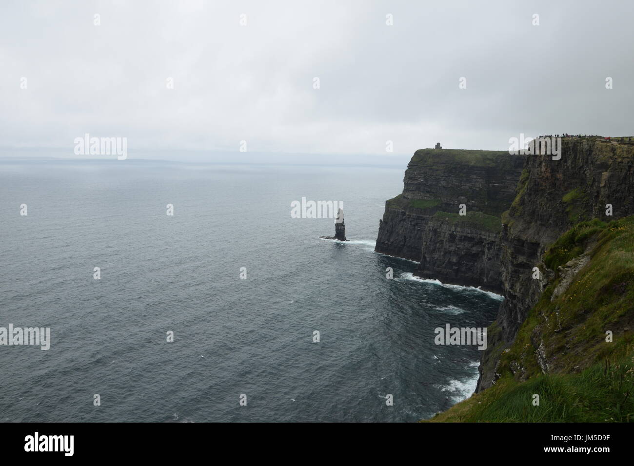 View of the Cliffs of Moher with O'Brien's Tower and Branaunmore sea stack in the County Clare, west Ireland Stock Photo