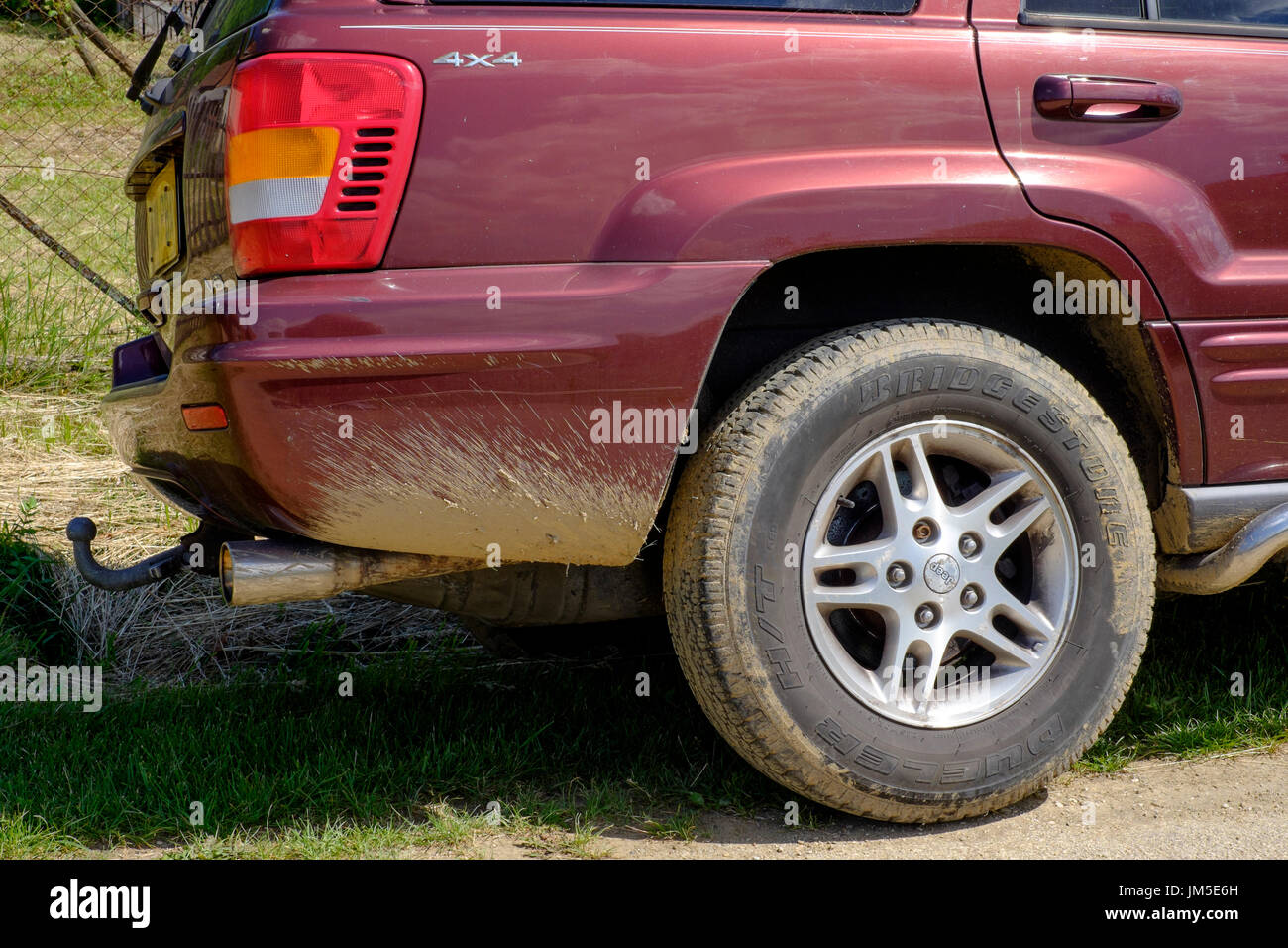 jeep 4x4 suv vehicle with uk number plates parked in a rural country lane at a village in zala county hungary Stock Photo