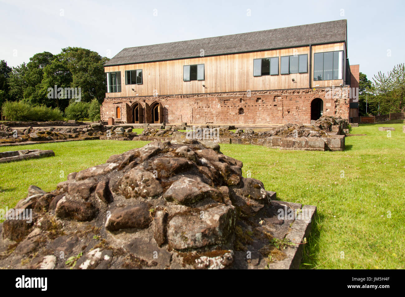 Norton Priory Museum & Gardens. Norton Priory ruins and burial grounds, with the undercroft in the background. Stock Photo