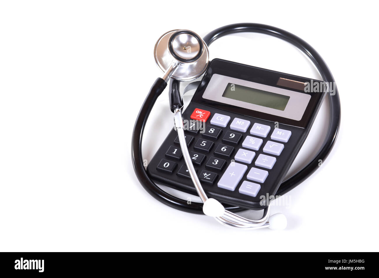 Stethoscope and calculator in health expenses or cost of medical care