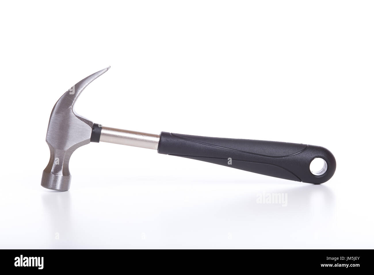 Traditional curvedclaw hammer tool with black plastic handle isolated