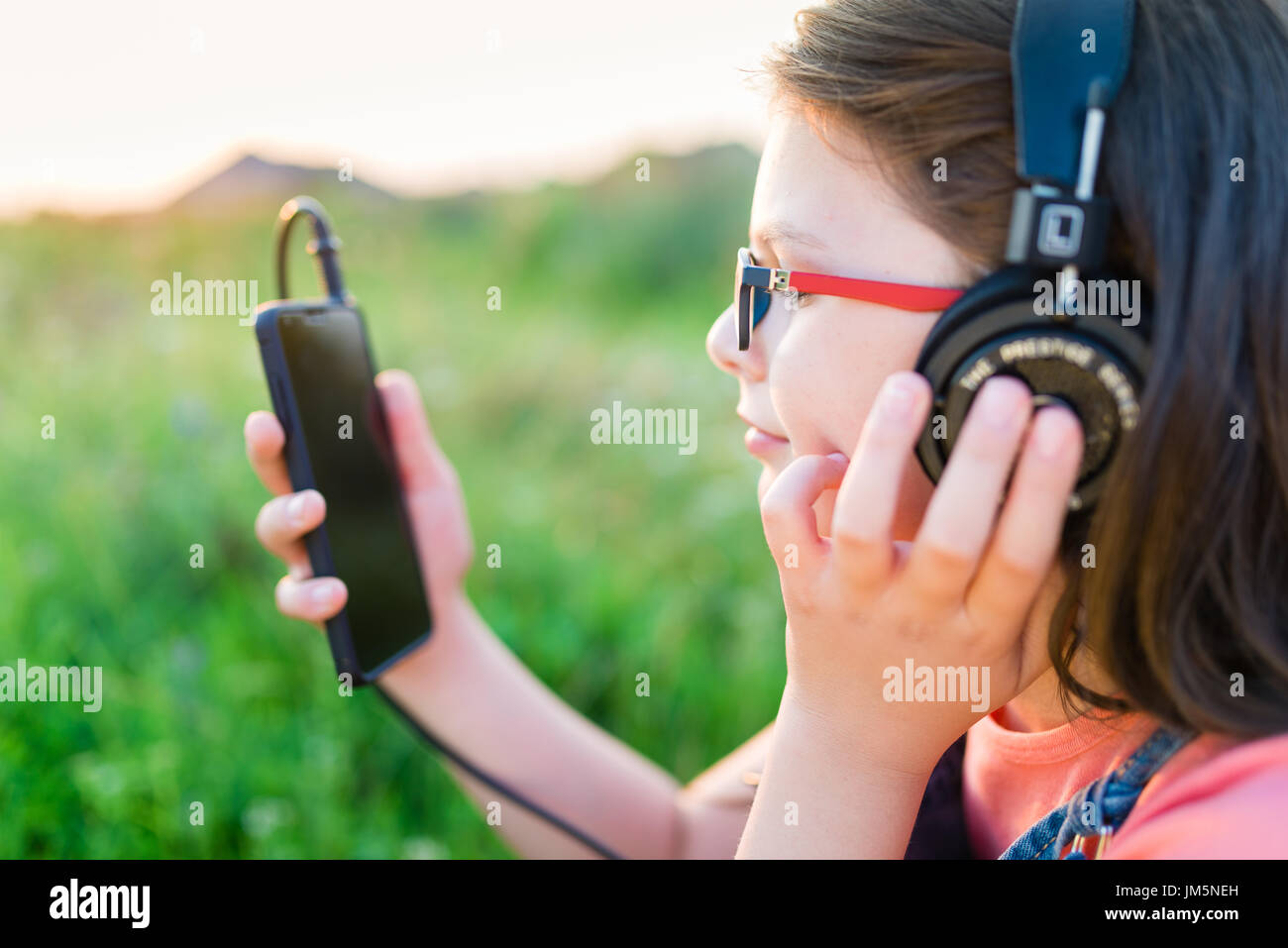 Portrait teen girl listening music hi-res stock photography and images ...