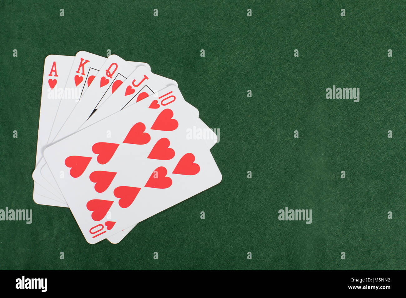 Gambling and poker concept with a hand of playing cards displaying a