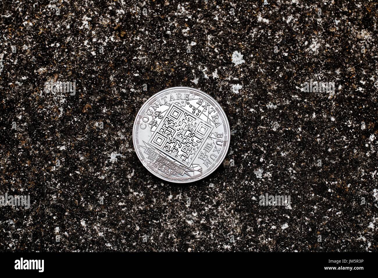Digital currency physical bitcoin coin on the dark background. Qr code ...