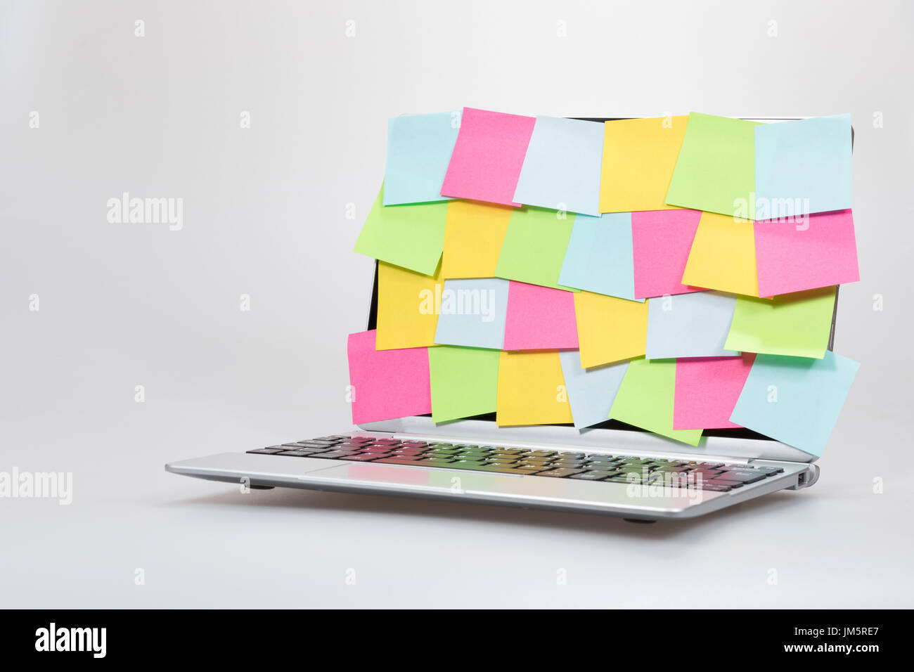 Colorful Blank Paper Memos Stuck To A Laptop Screen In A Concept Of 