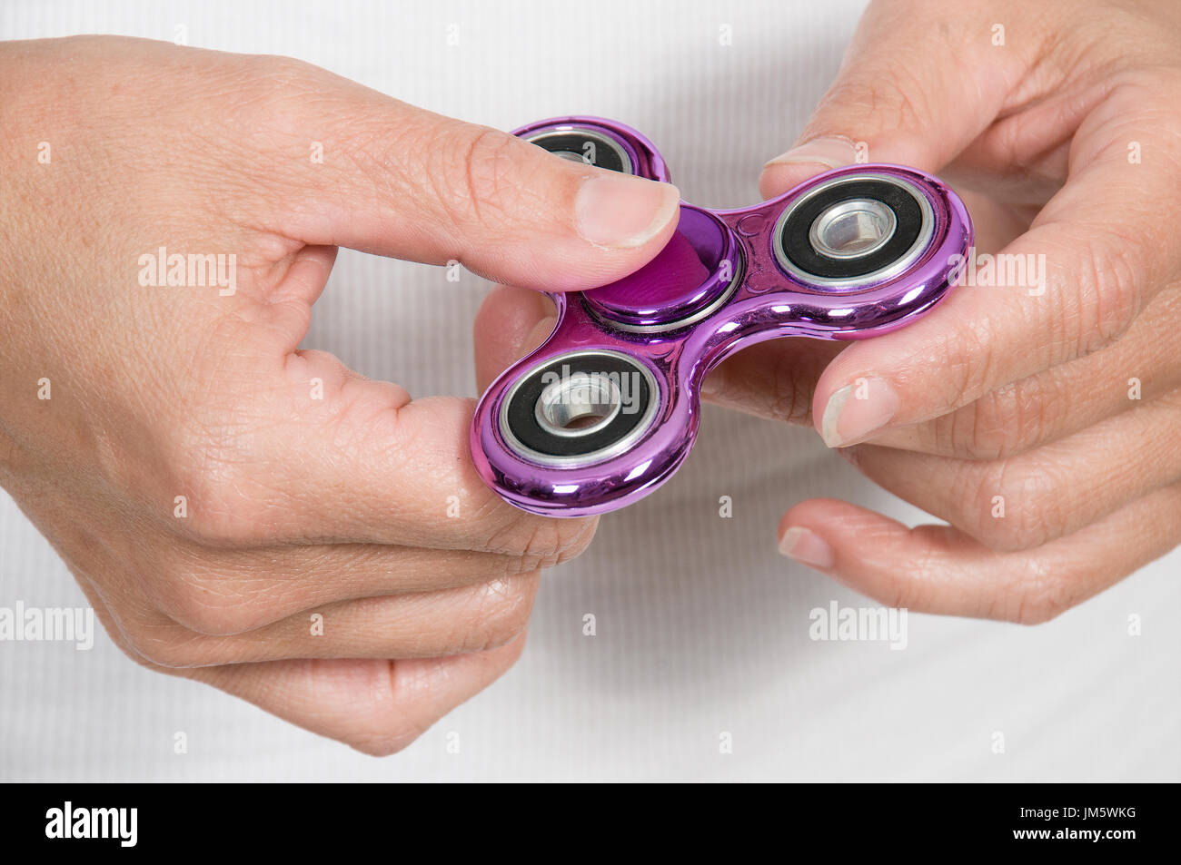 Popular fidget spinner toy that is the latest fad Stock Photo - Alamy