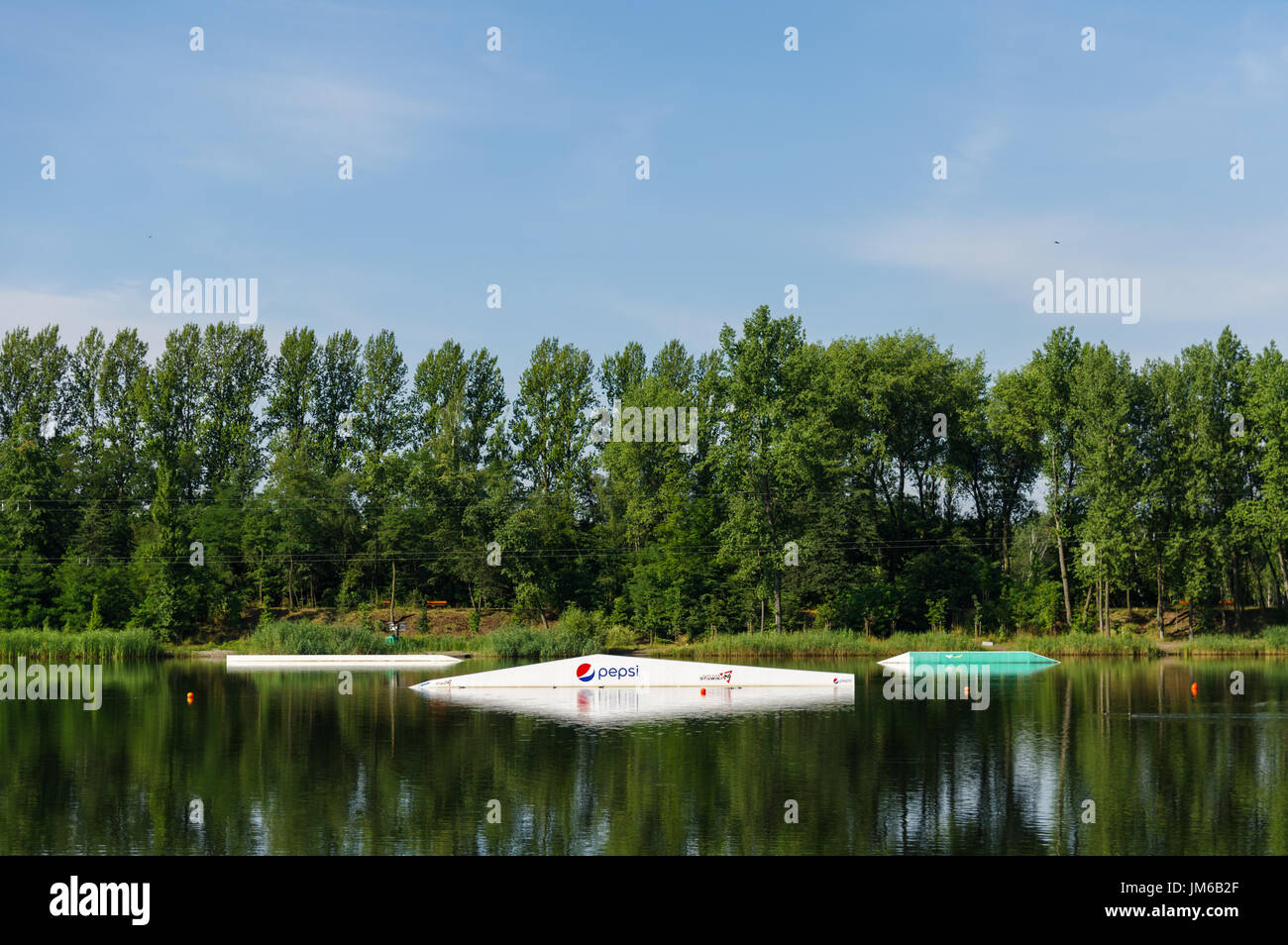 Wakeboarding / Cable skiing obstacles /  Wake Zone Stawiki in Sosnowiec, Poland Stock Photo