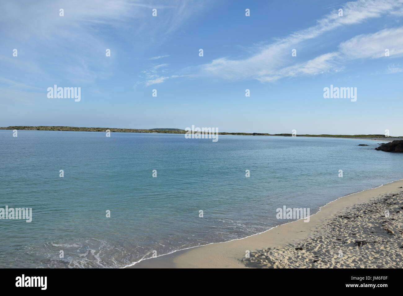 Sandy beach next to Wild Atlantic Way in the County Galway, Ireland Stock Photo