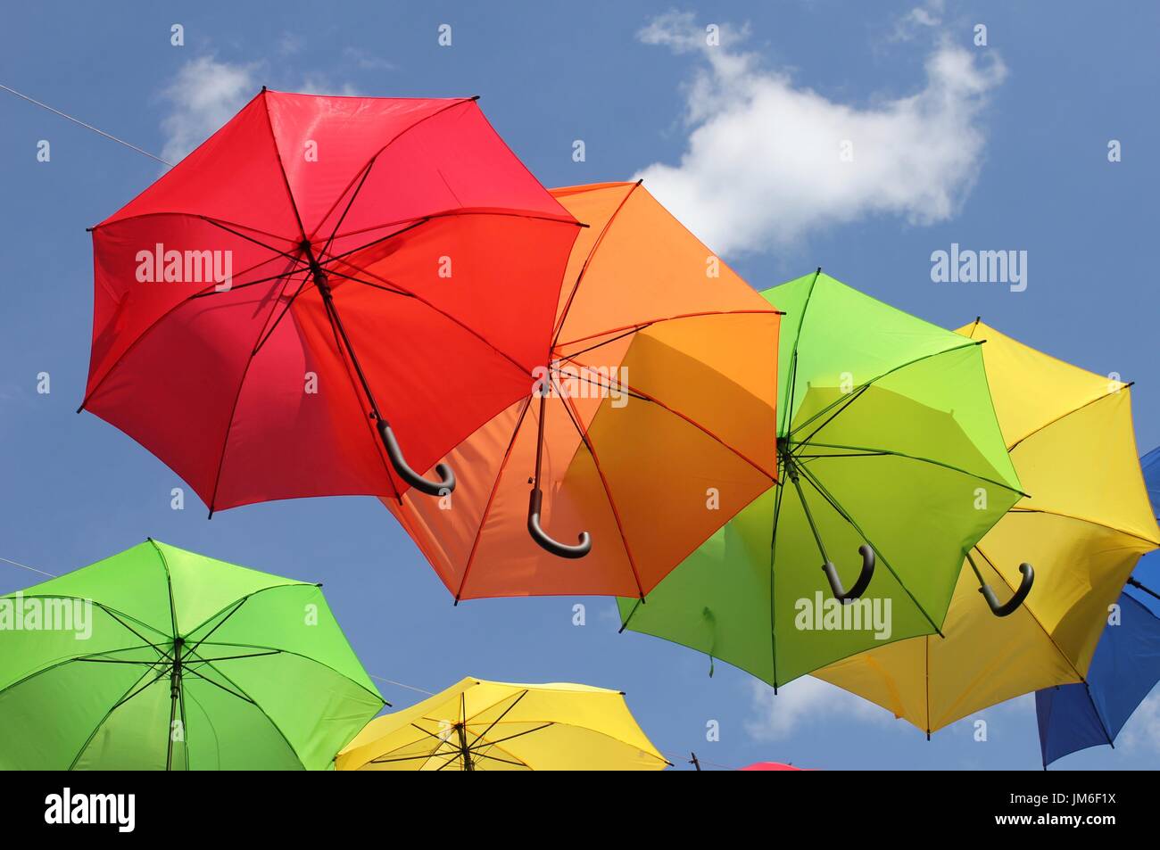 Colorful umbrellas flying in air hires stock photography and images