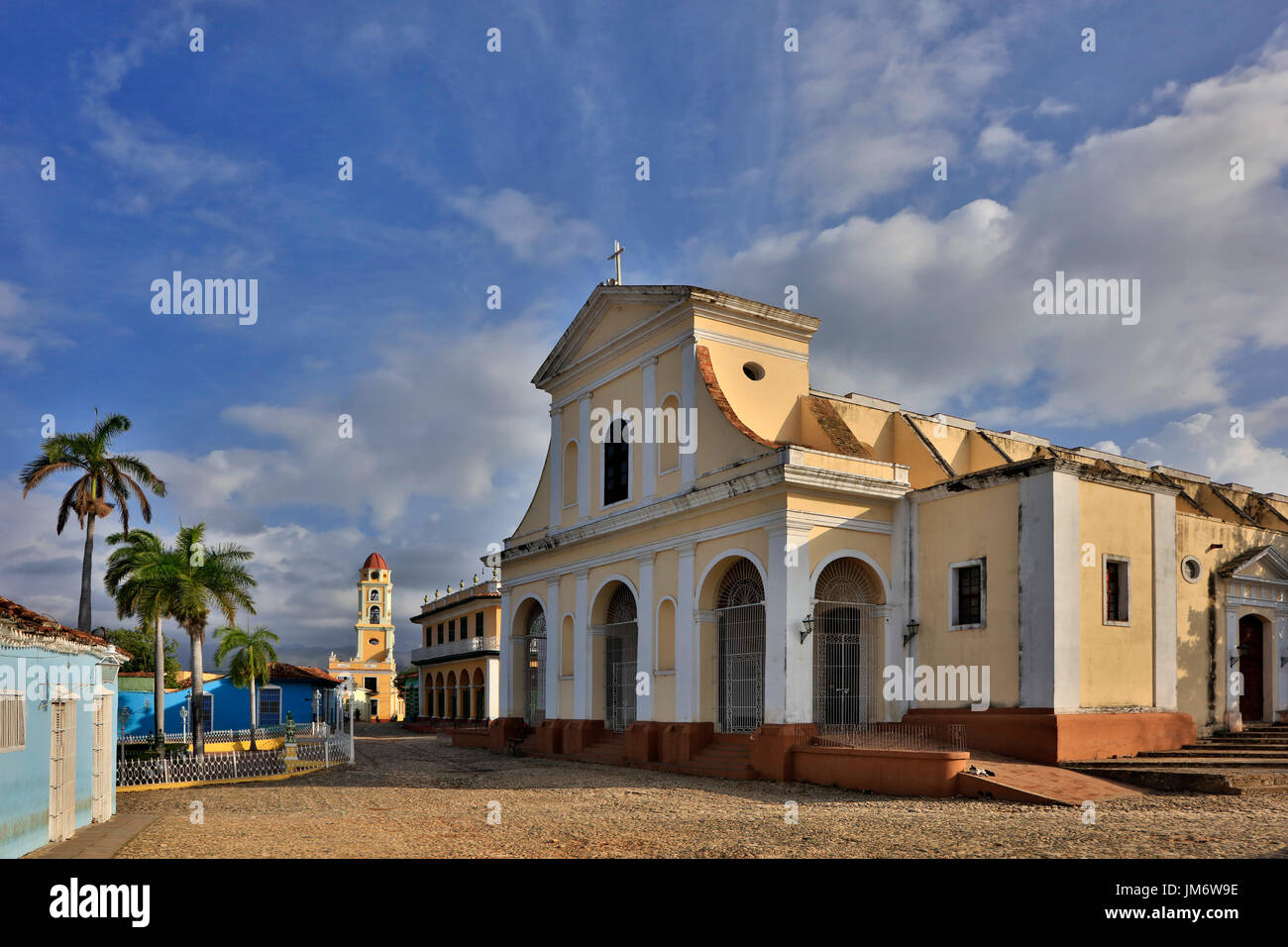 The IGLESIA PARROQUIAL DE LA SANTISIMA TRINIDAD is located on PLAZA MAYOR - TRINIDAD, CUBA Stock Photo