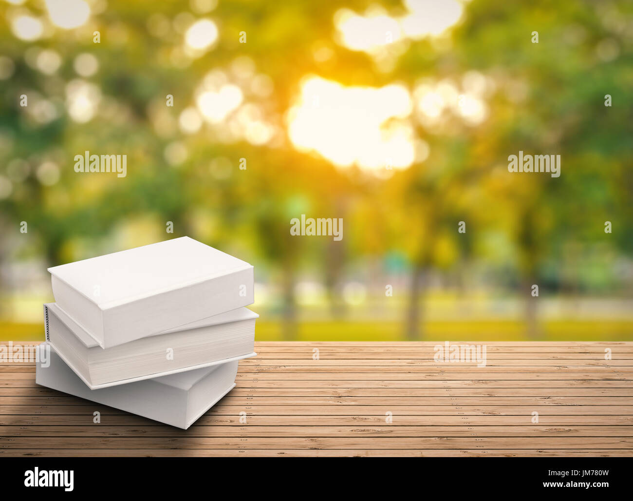 stack of blank notebooks on wooden table Stock Photo