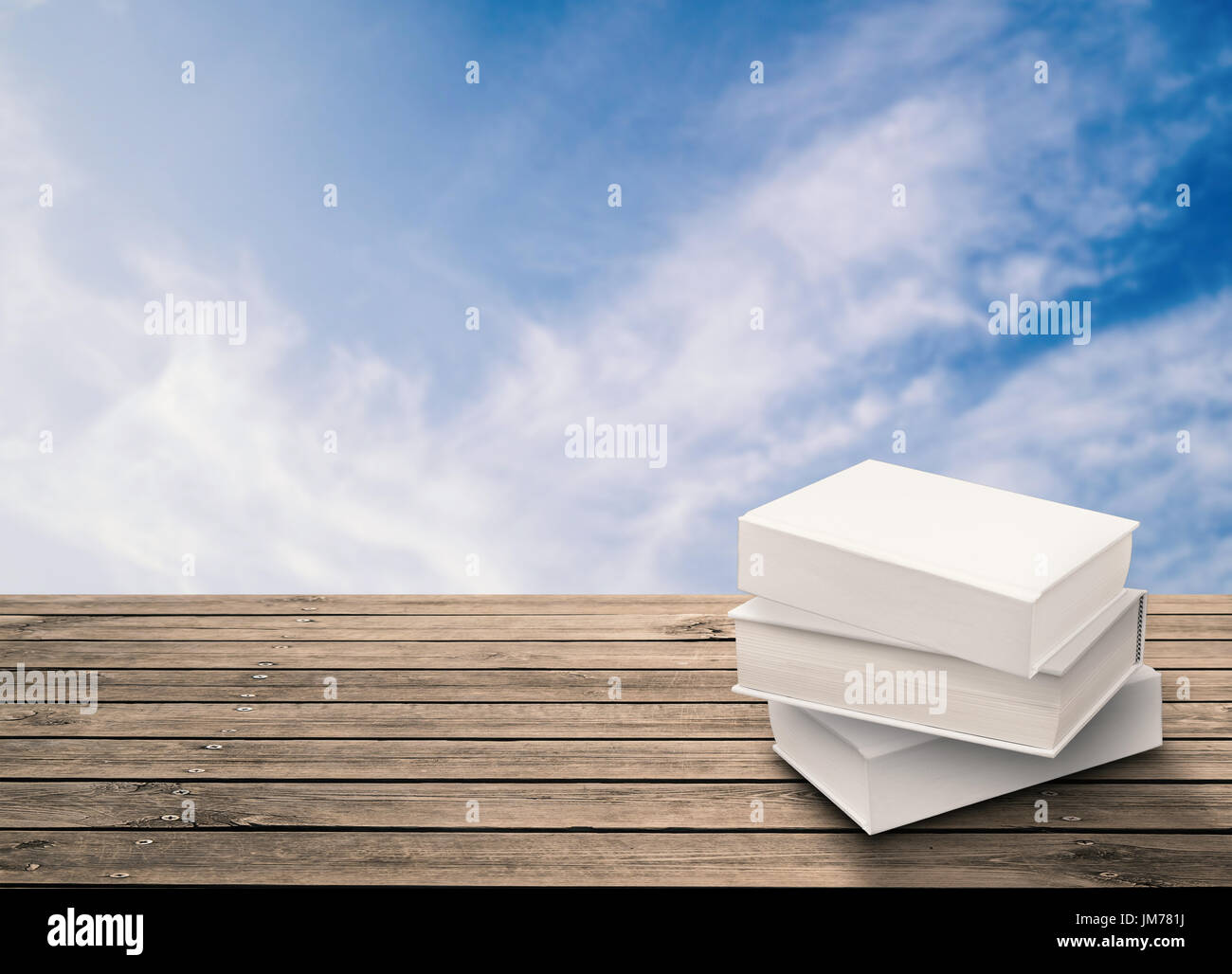 stack of blank notebooks on wooden table Stock Photo