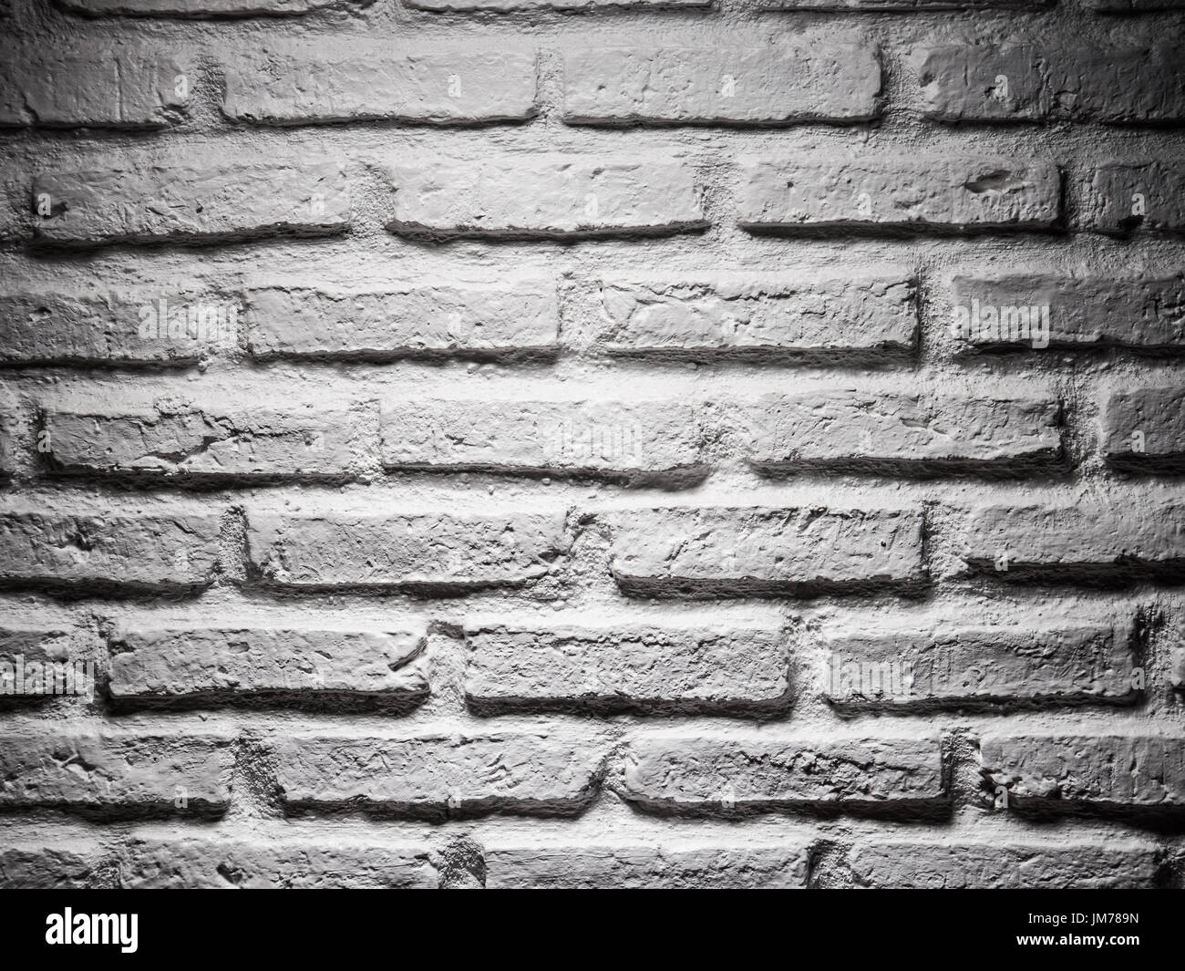 white brick wall background with rough texture Stock Photo