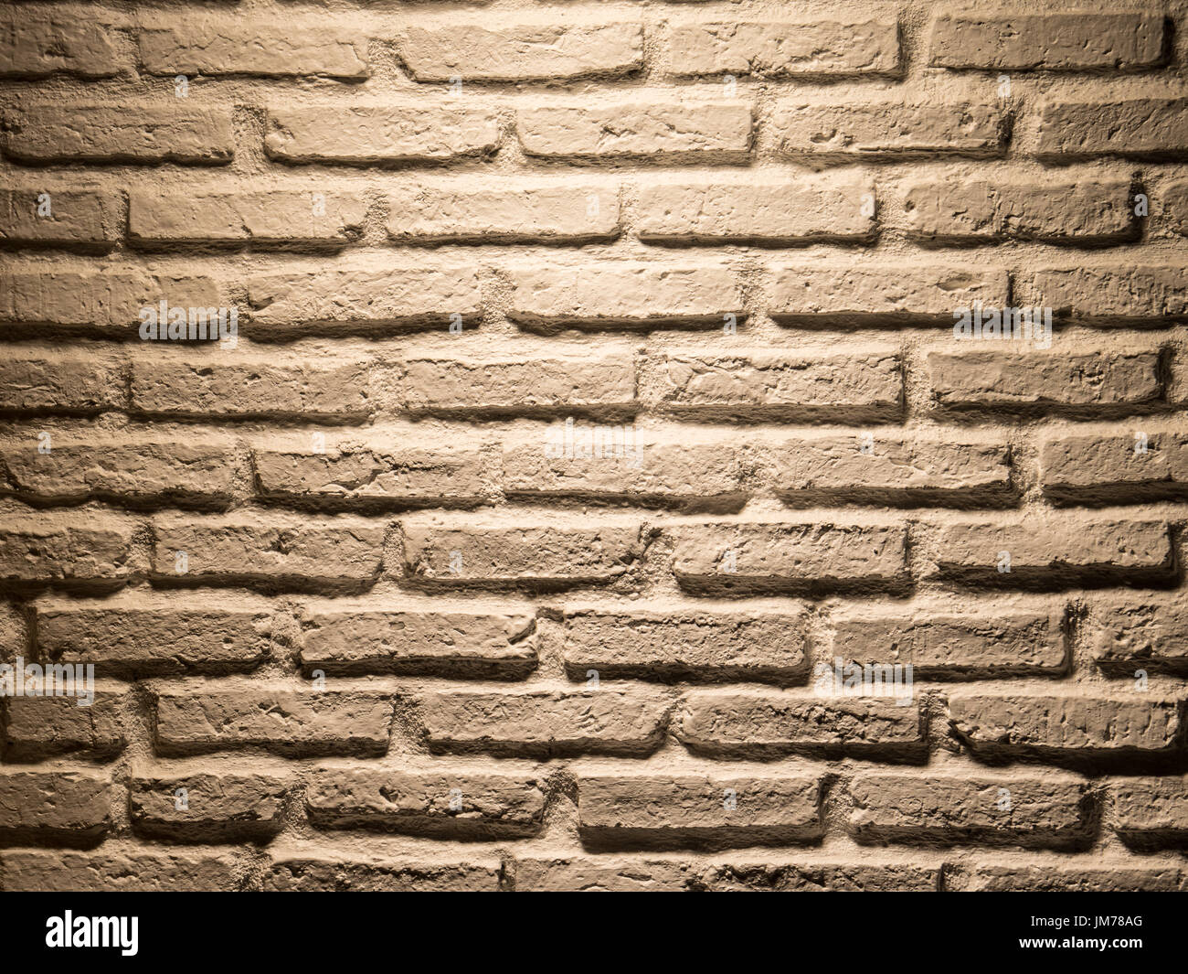 white brick wall background with rough texture Stock Photo