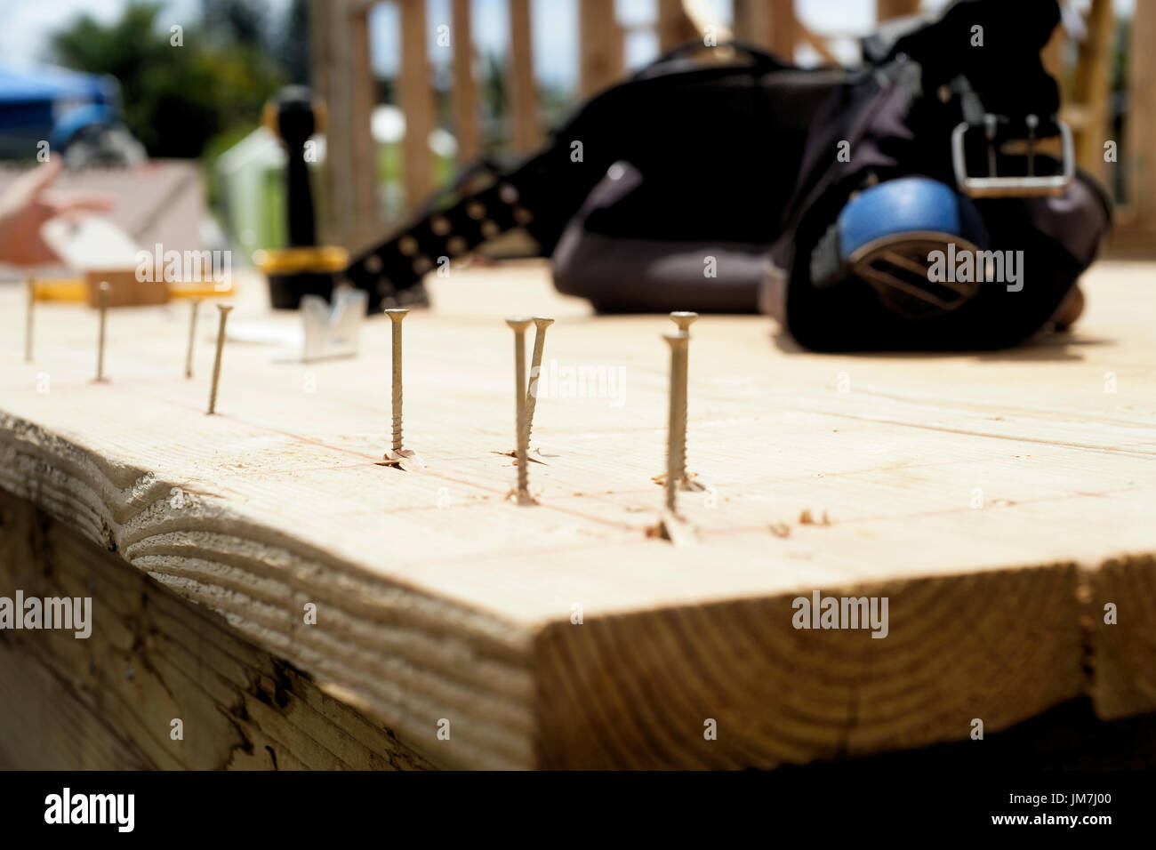 construction site nail on wood tool bag in the background Stock Photo