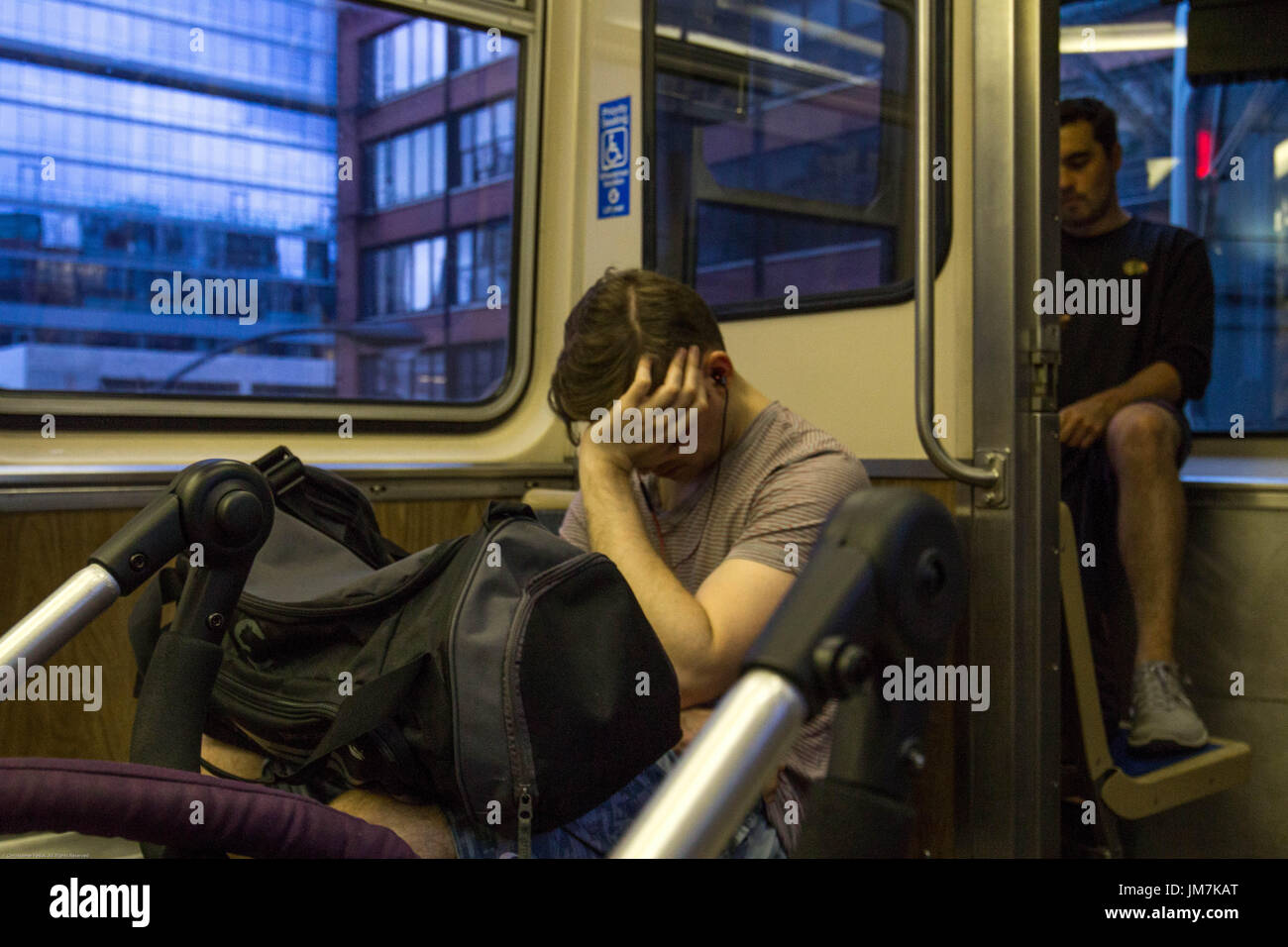 sleeping and waiting on the train. Stock Photo