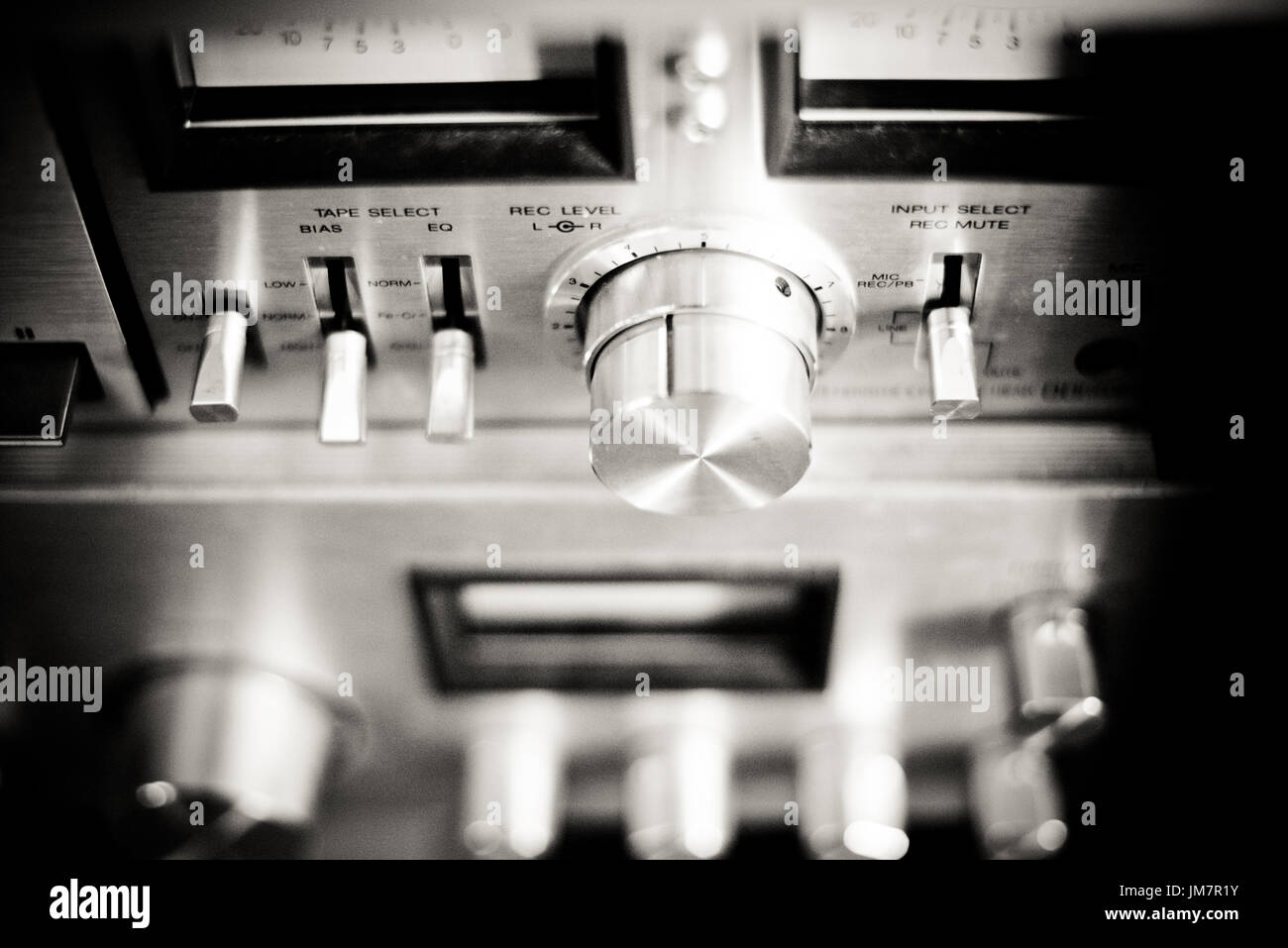 Old fashioned hi-fi music system equipment, amplifier and tape player detail concept of past time Stock Photo