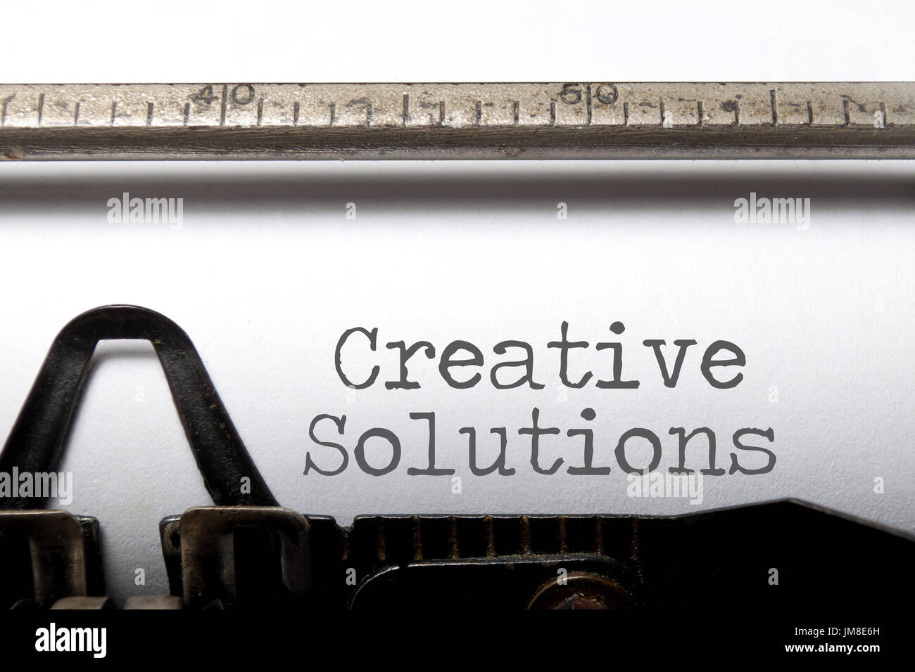 Creative solutions printed on a typewriter Stock Photo