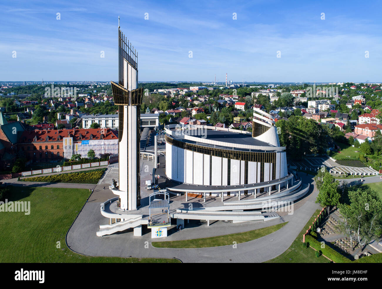 KRAKOW, POLAND - JUNE 02, 2017: Sanctuary of  Divine Mercy, church, park and cemetery in Lagiewniki, Cracow, Poland. Aerial view. Stock Photo
