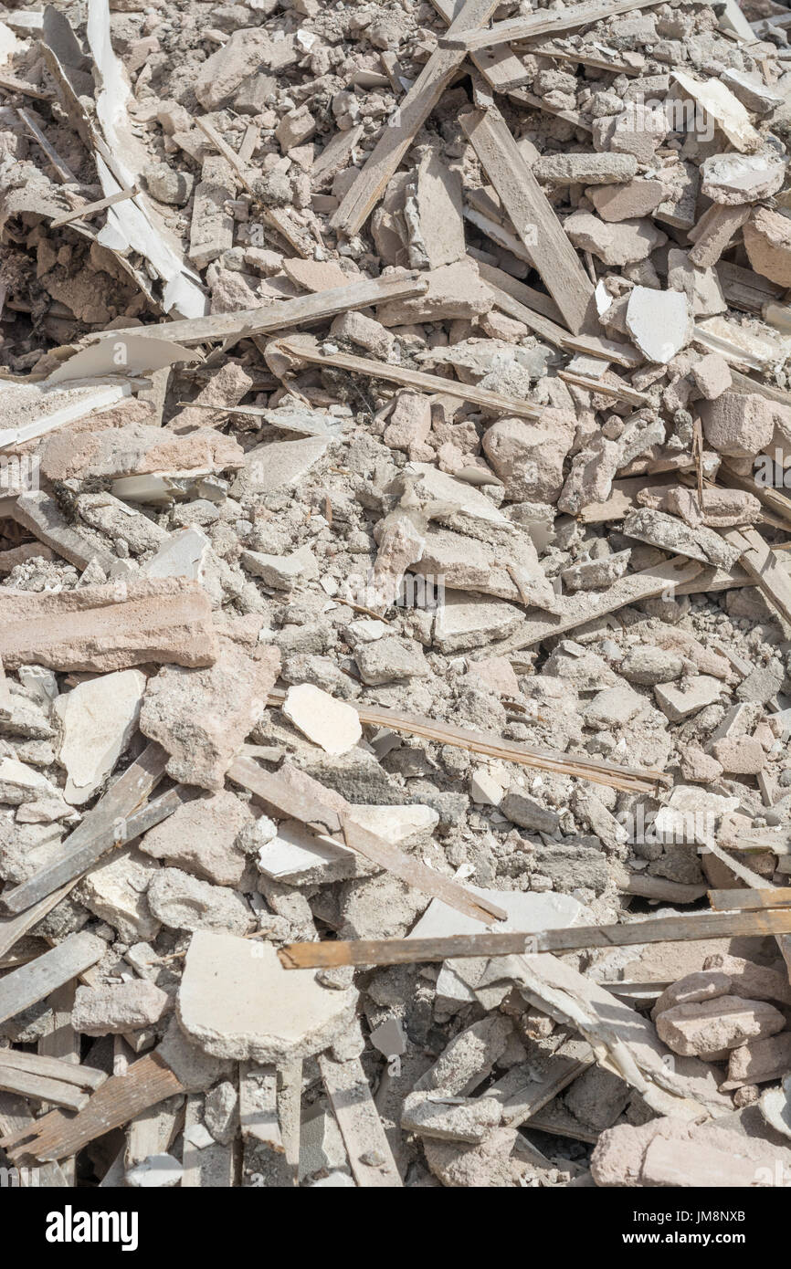 Builder's rubble - specifically old lime-based lath and plaster ceiling debris from old cottage. For broken in pieces, shattered, US banking collapse. Stock Photo