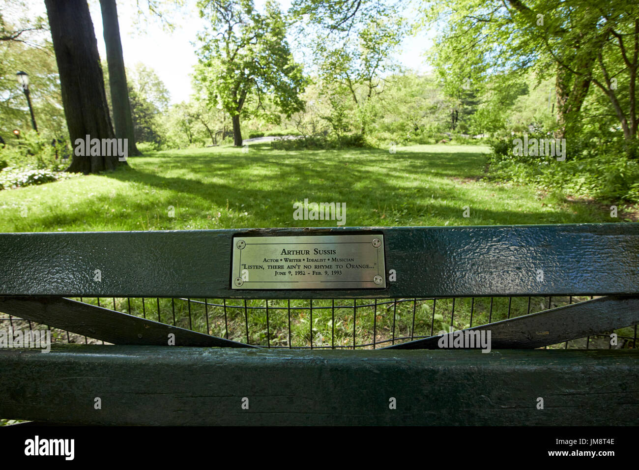 park bench in central park dedicated to arthur sussis New York City USA Stock Photo