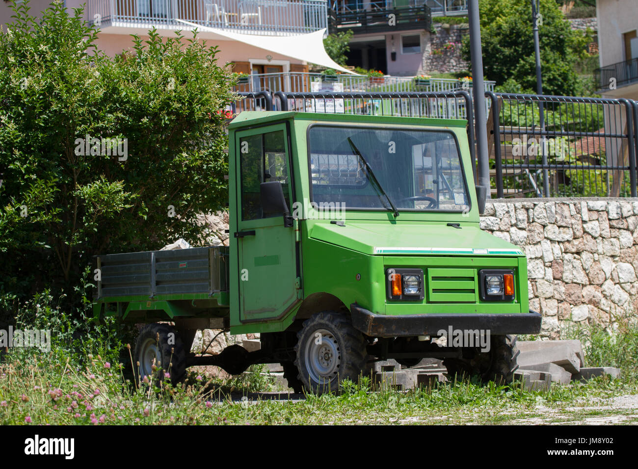 Small green pickup truck. Italy Stock Photo
