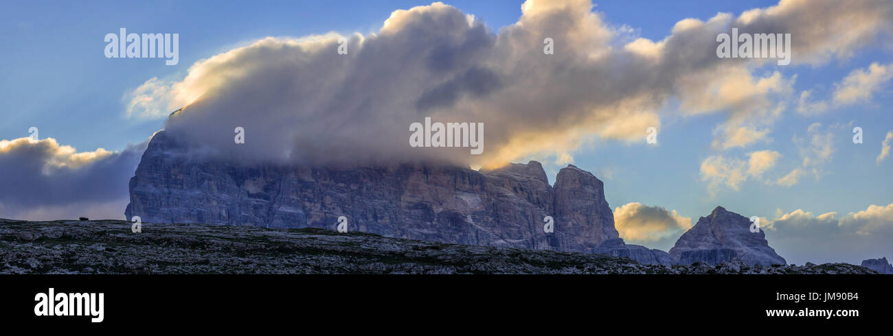 Mountain massif in the italian Dolomites, the Croda dei Toni, in the Twelver, part of the Sextner Alps, viewed near the Three Peaks, at dawn Stock Photo