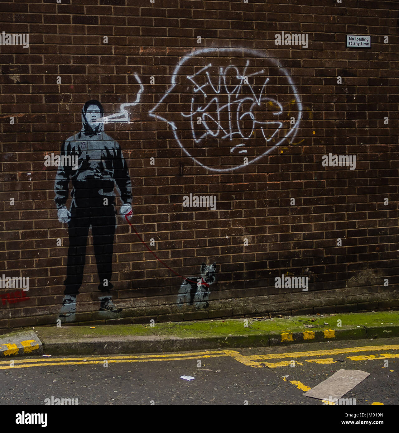Banksy style graffiti in Glasgow Stock Photo