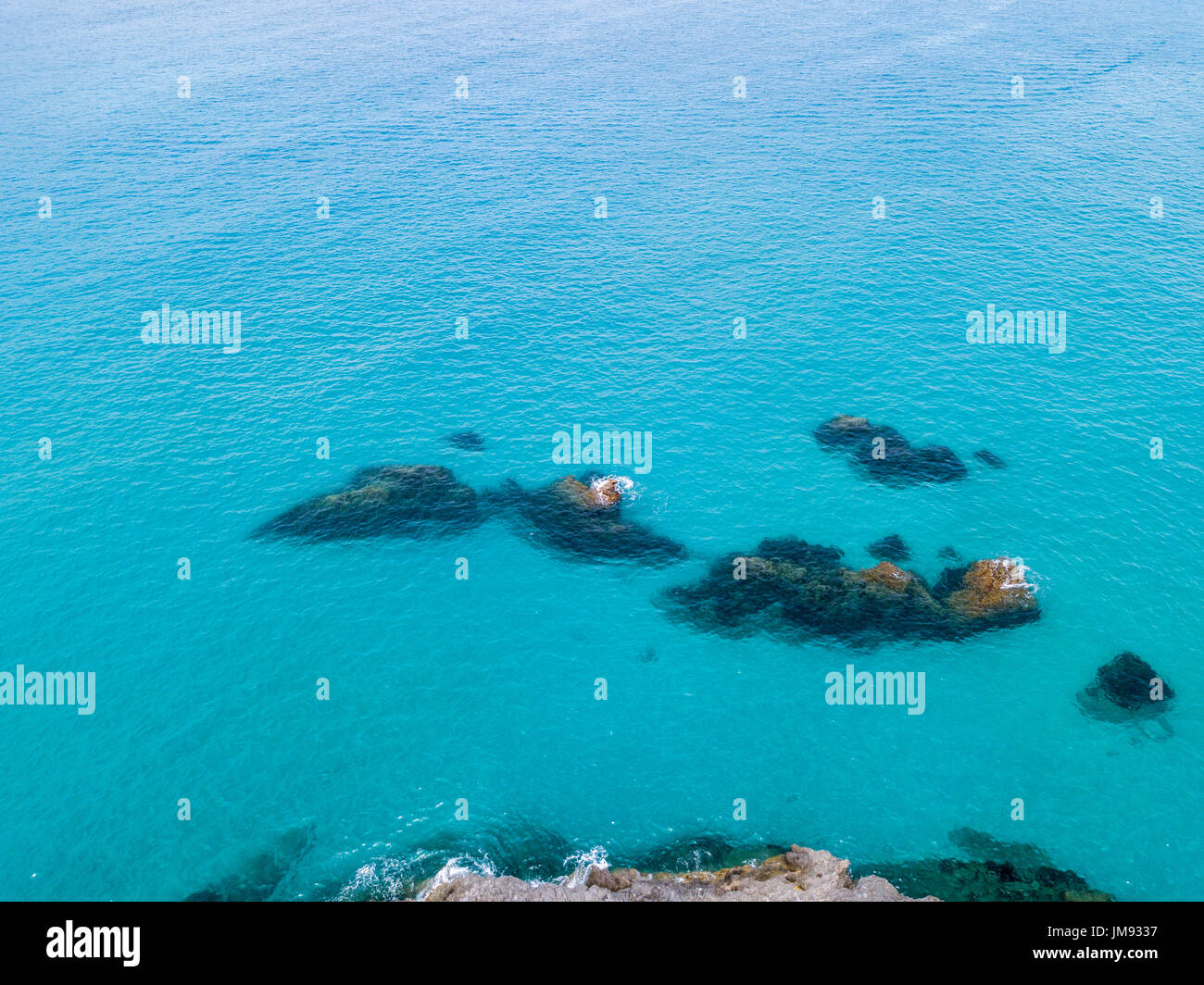 Aerial view of rocks on the sea. Overview of the seabed seen from above, transparent water Stock ...